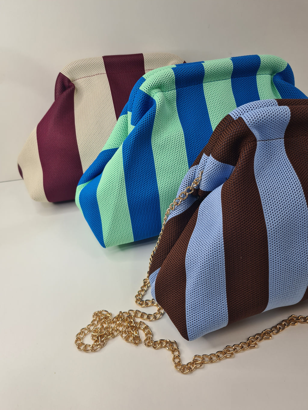 BOLSO DE MANO RAYAS